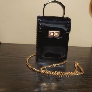 Box style cross body purse with gold chain strap